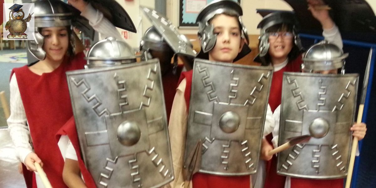 Primary school children dressed as Roman soldiers with helmets and shields